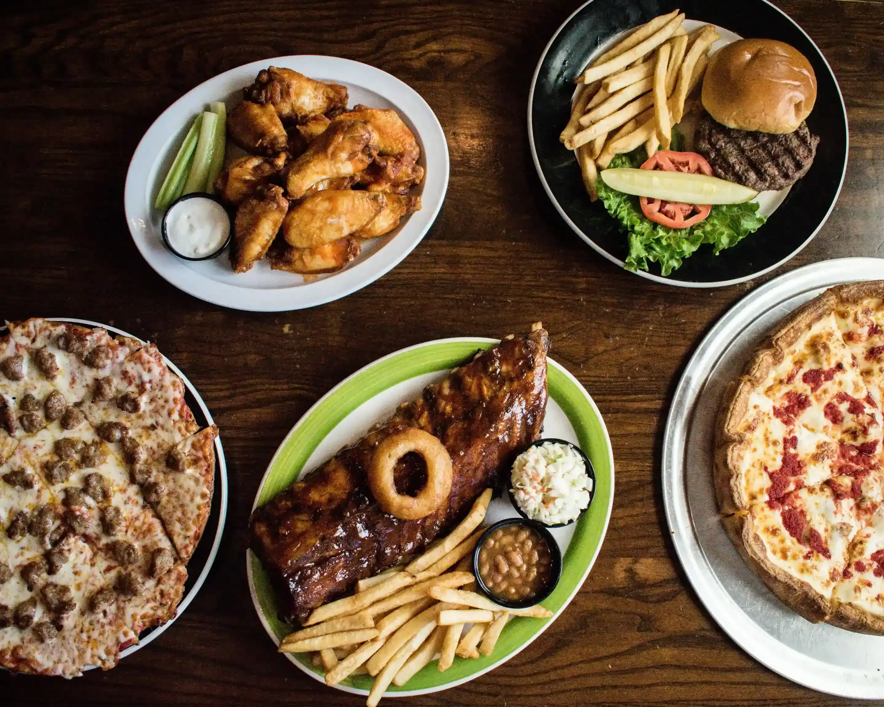 Beef burger with fries at Colonial Pub Grill